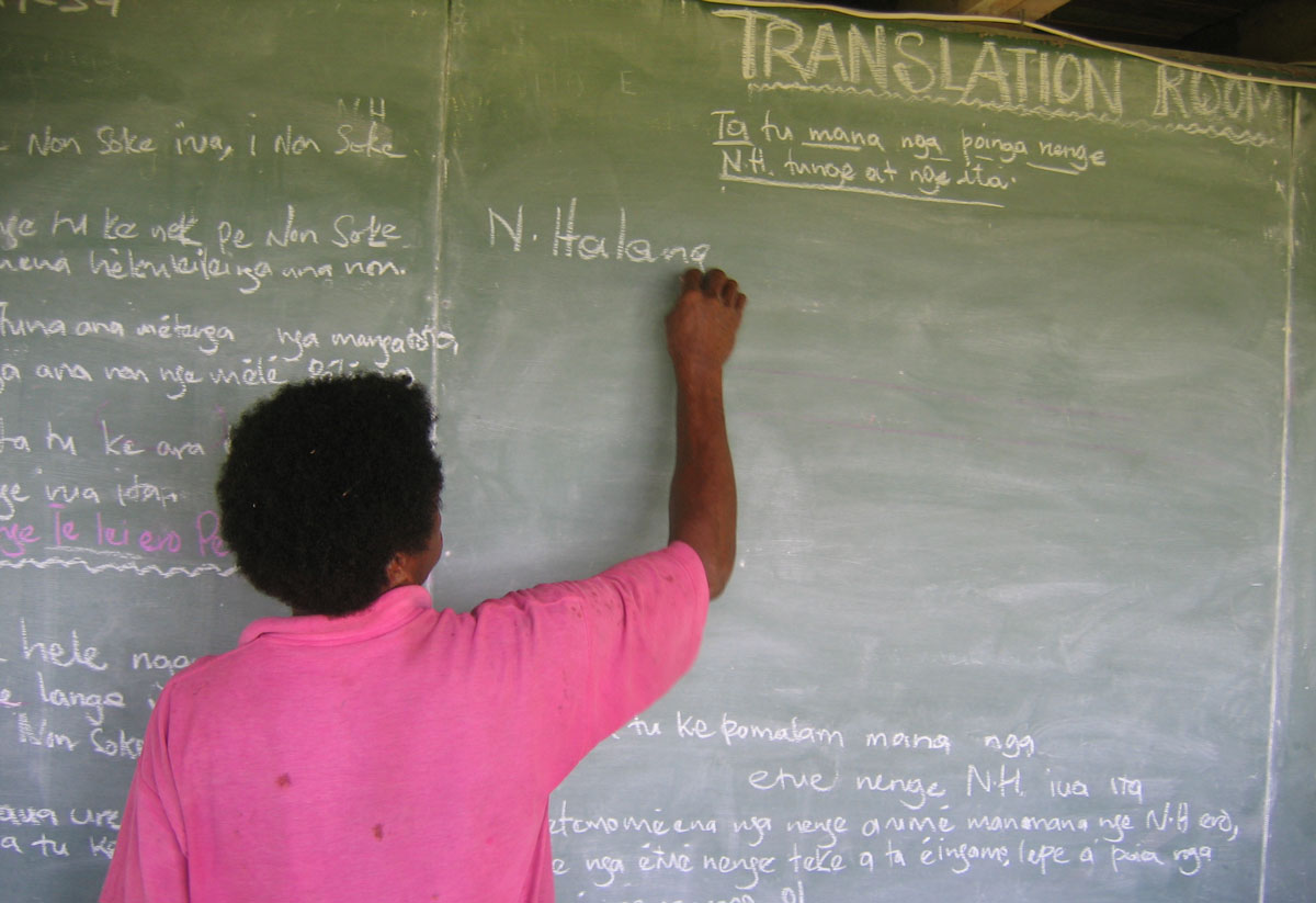 Teaching at a chalkboard